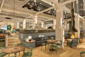 Een kamer met tafels en stoelen.