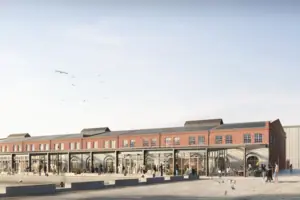 Een gebouw met mensen op de voorgrond.