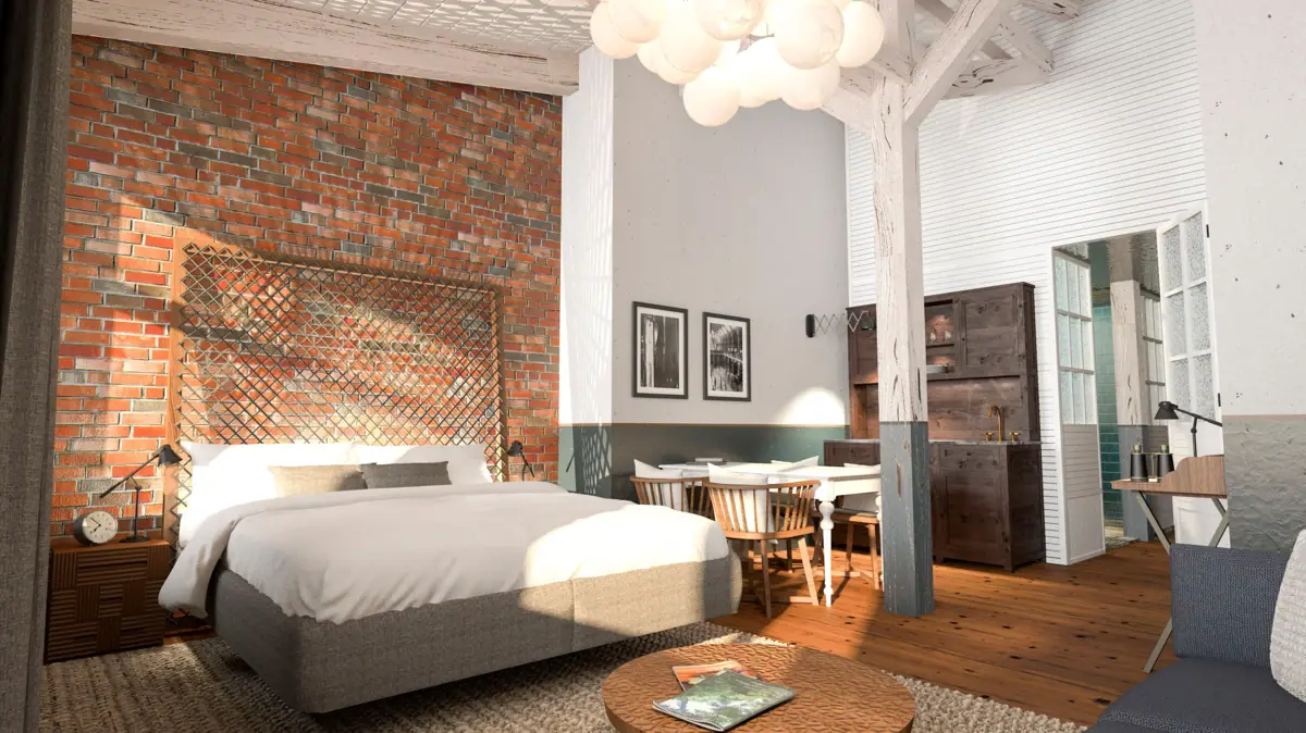 Binnenzicht van een hotelkamer in het HENRI Hotel Cuxhaven met een bed, tafel en stoelen.