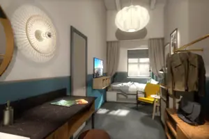 Een kamer met een bed en een stoel.