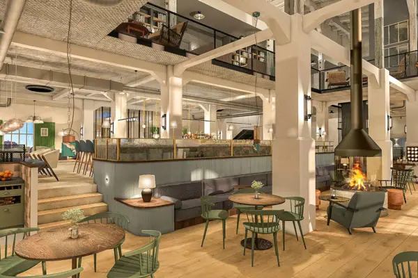 Een kamer met tafels en stoelen.